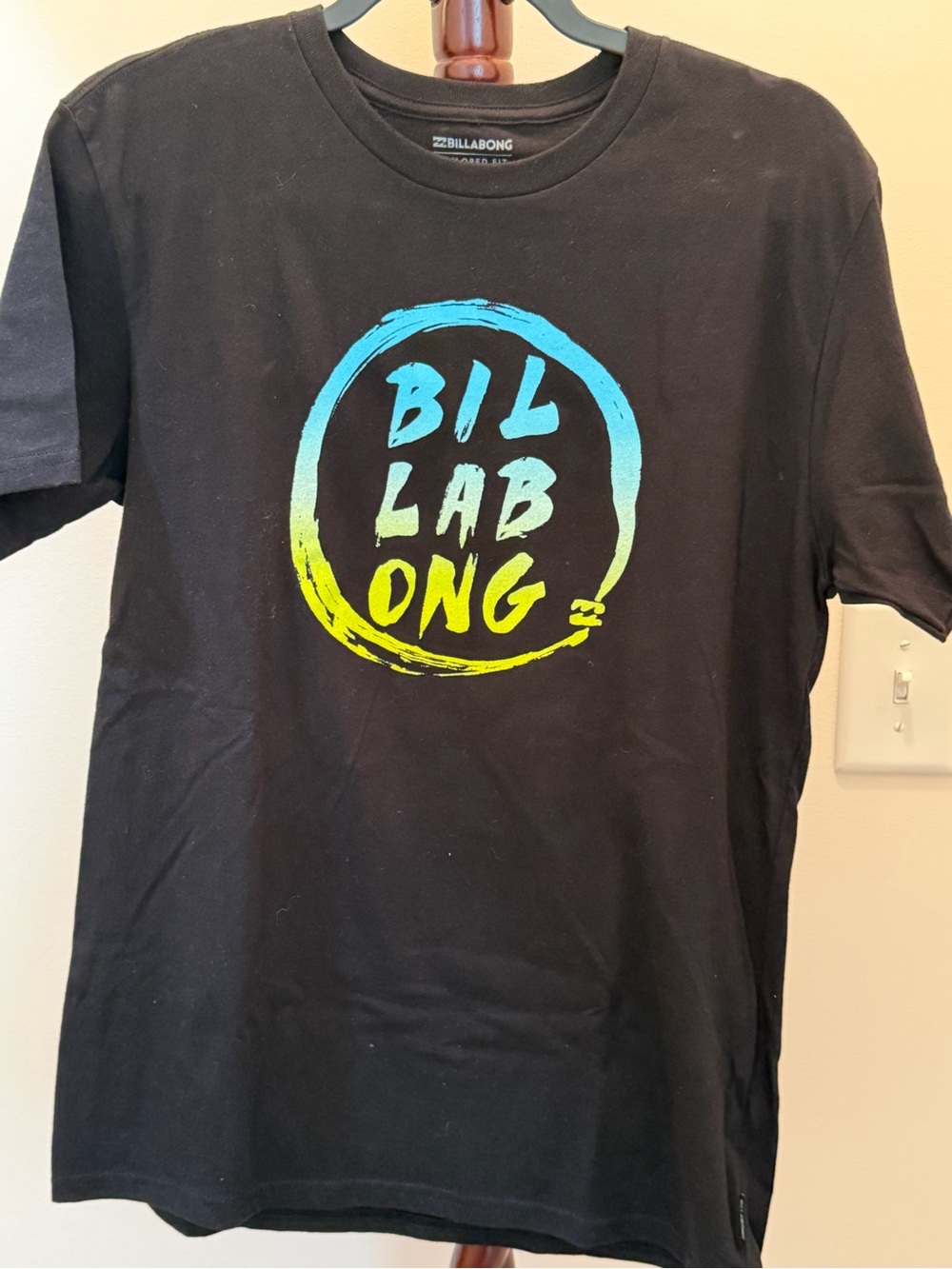 Billabong Black Tee with Blue-to-Yellow Gradient Logo